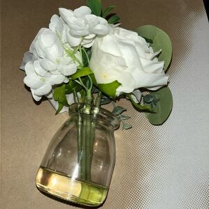 8 small artificial flower vases in water